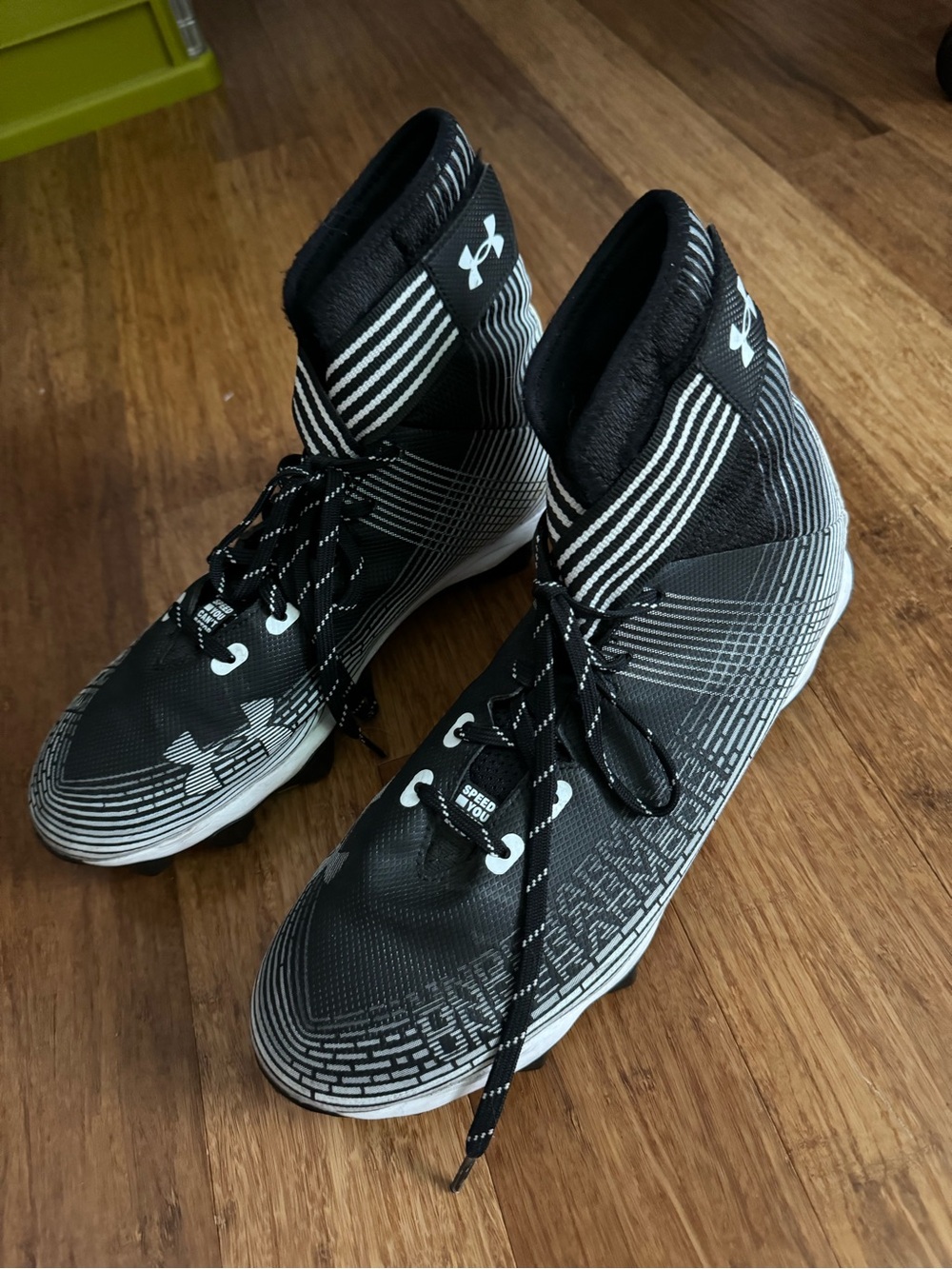 Under Armour Men’s Black and White High-Top Football Cleats